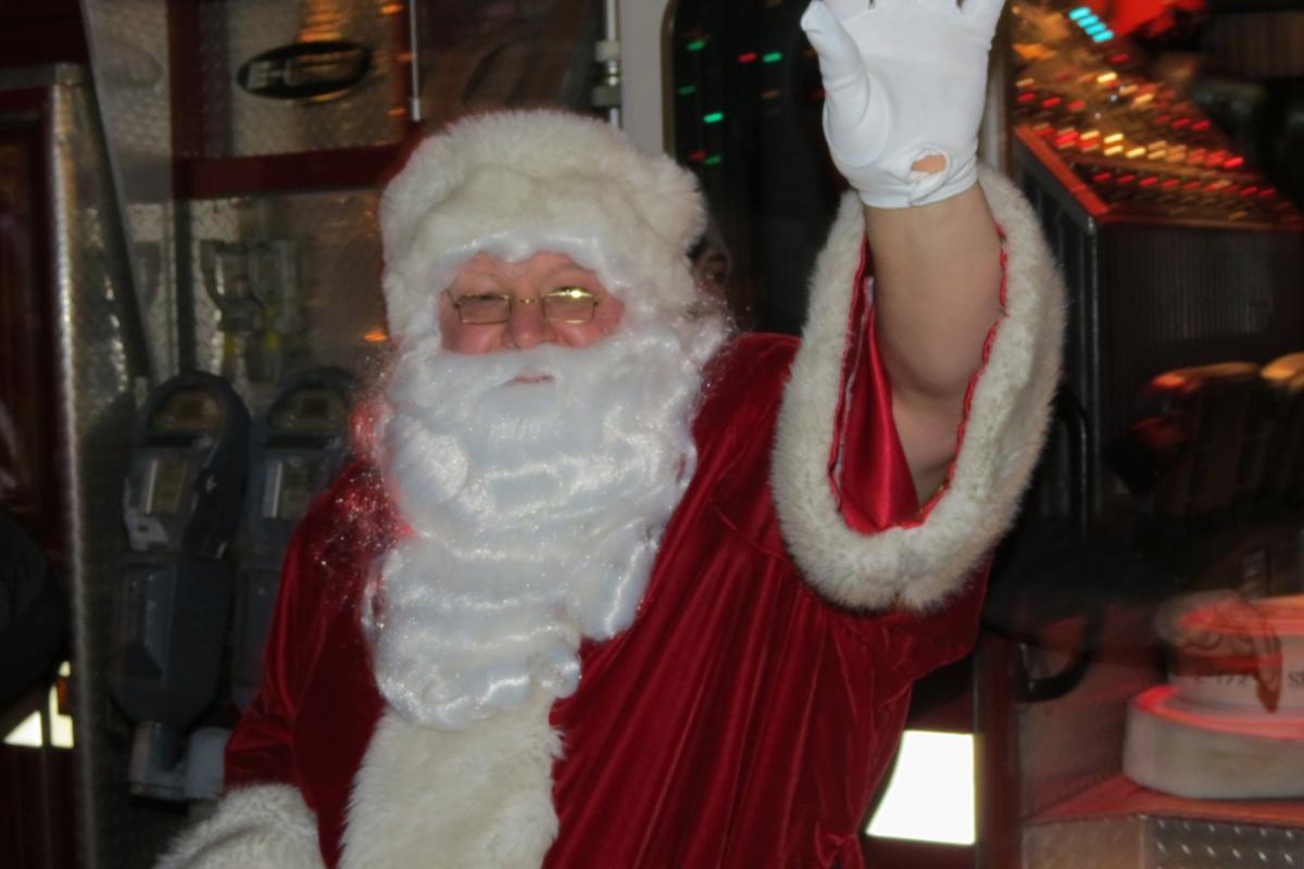 Close up of Santa waving